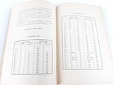 an open book that has a table of numbers on it