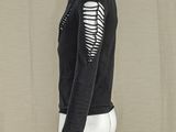 a mannequin wearing a black top with a zebra print design on it