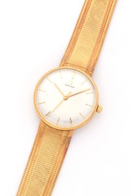an image of a close up of a wrist watch on a white surface