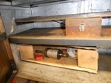 a wooden shelf with a bottle of wine in it