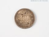 an image of a coin on a white surface