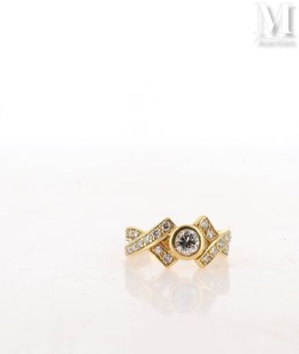 a close up of a gold ring with diamonds on it