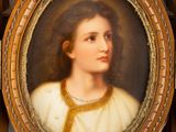 portrait of a young woman in a gold collared dress