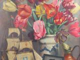 a painting of a vase of tulips and a picture of a ship on a table