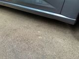 a car that is parked on the side of the road