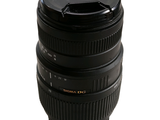 a camera lens that is sitting on top of a cup