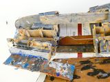 a model of a boat that is being worked on