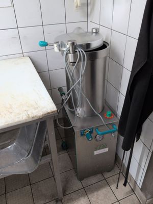 a machine that is sitting in the corner of a room
