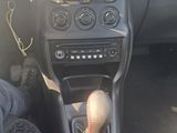 a picture of a car dashboard with a steering control