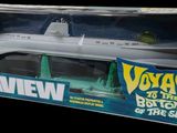 the box is open to show the model of a submarine