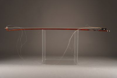 an image of a wooden and acrylic table with a glass base