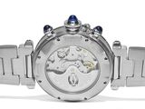 a close up of a watch on a white surface