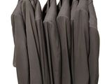 a lot of jackets hanging on a rack on a white background