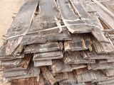 a pile of wood that is sitting on the ground