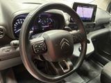 the interior of a car with a steering wheel, dashboard, and dash board
