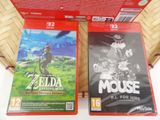 two nintendo wii games sitting on top of a table next to each other