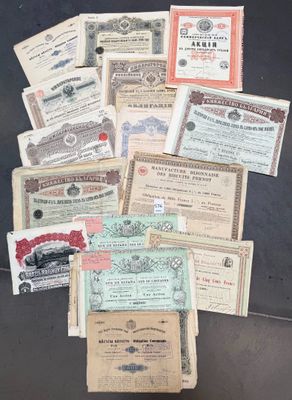 many different types of old paper money are on a table