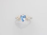 a blue topaz and diamond ring