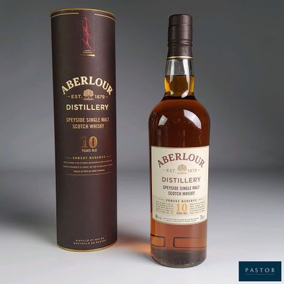an image of a bottle of whisky next to a cardboard box