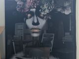 a picture of a woman with a flower crown on her head