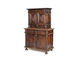 an image of a wooden cabinet with carvings on it