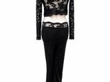 a mannequin dress with a black lace top and black pants
