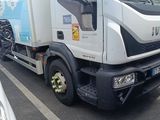 a truck that is parked on the side of the road