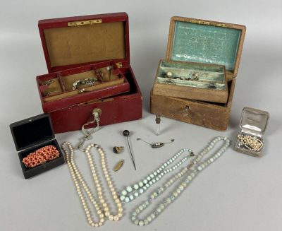 a lot of jewelry sitting on a table together