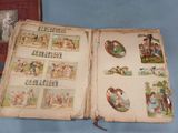 an open book with pictures of people and animals on it