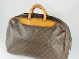 louis vuitton monogram canvas and leather travel bag