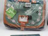 two bags of toiletry bags sitting on a table