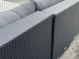 a couch that is sitting on the side of the road