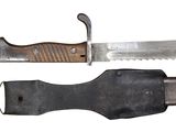 a knife and a knife holder on a white background