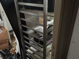 an image of a kitchen with a rack of food in it