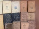 a lot of old books on the table together