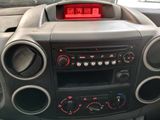 a car dashboard with a digital clock on it