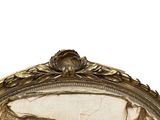 a silver plate with a fish on it