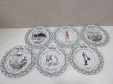 six assiettes à motifs différents posées sur une table