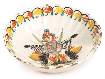 a white bowl with a floral design on it