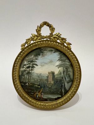 tableau représentant un paysage avec un château en arrière-plan, dans un cadre doré
