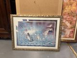 a picture of a painting on the floor next to a picture of birds