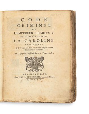 an old book with a black and white image of a bird on it