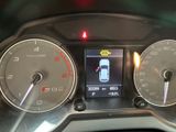 dashboard of a car with a digital display showing the speed of a car