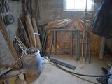 a picture of a room with a lot of tools on the floor