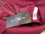a label on a red jacket that says we ' ve got it