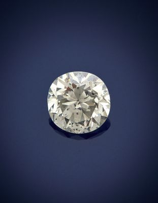 an unmounted diamond on a blue background