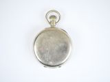 an old silver pocket watch on a white surface with a white background