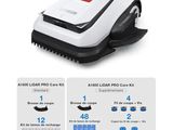 a white and black robotic lawn mower with instructions on it