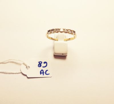 a ring with a price tag attached to it