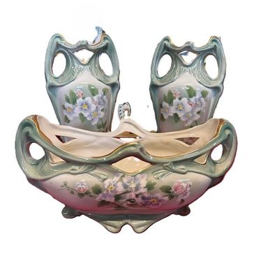 two vases that are sitting on top of each other